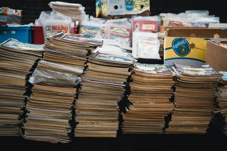 boxes full of newspapers and cartons of cereal