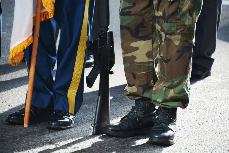 several people in uniform standing beside each other