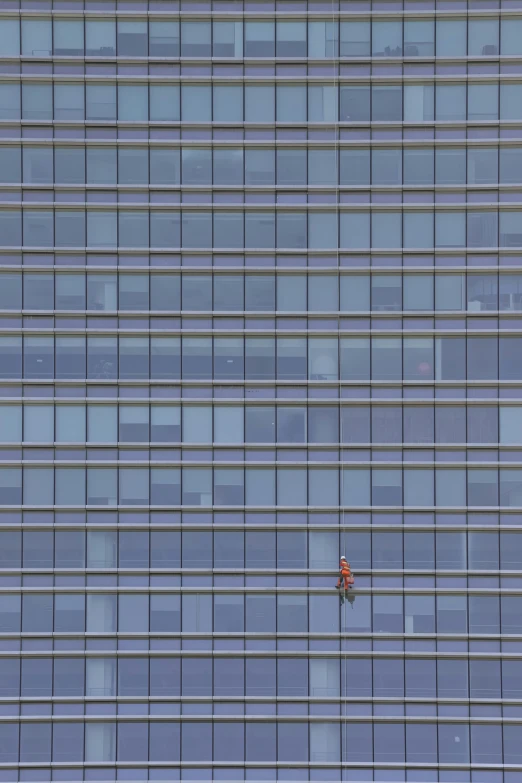 a man standing in the middle of a window