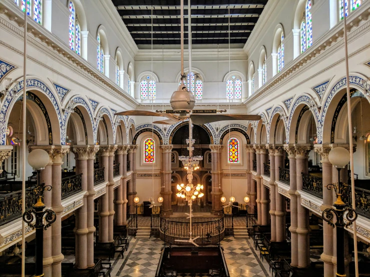 the inside of an elaborate church, looking into its altar