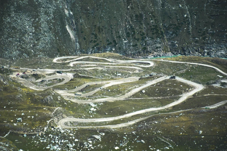 the view looking down at a muddy road