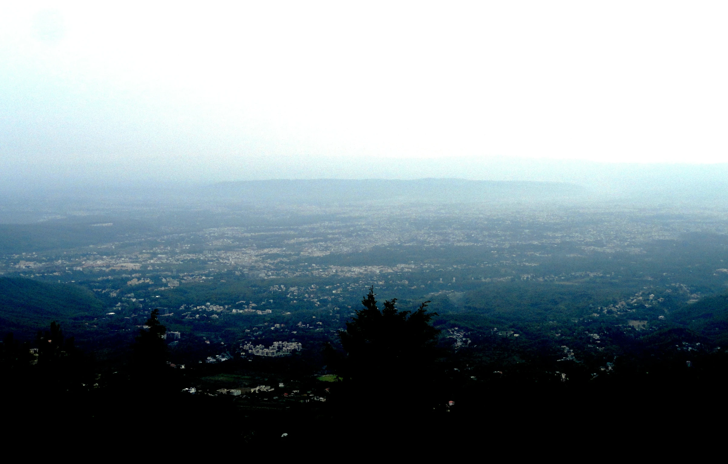 a view of a city is seen in the distance