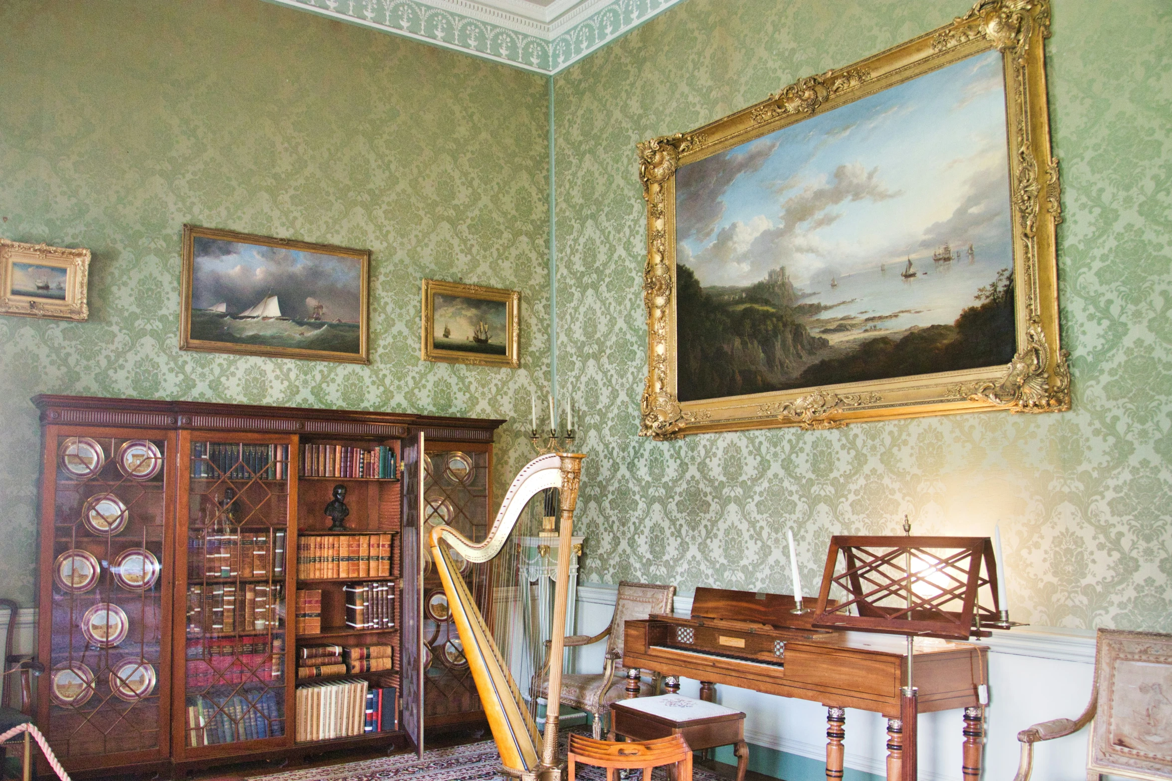 a large painting and artwork in a room