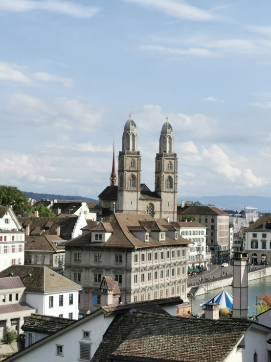 a large building with two towers standing in the middle of it