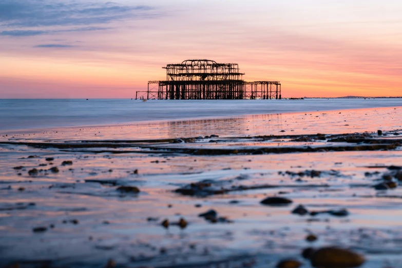 this is an image of a beach at sunset