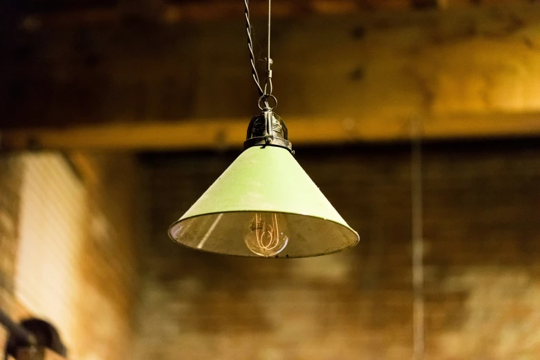 a close up of a light fixture in the living room