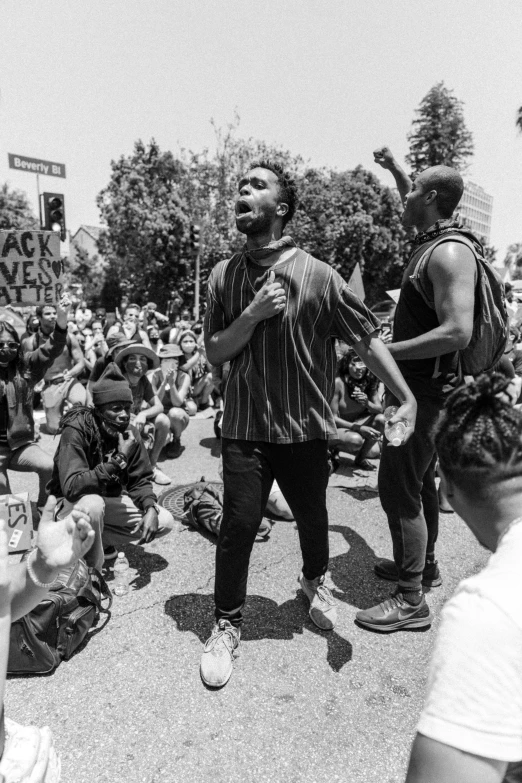 a man standing in front of a group of people