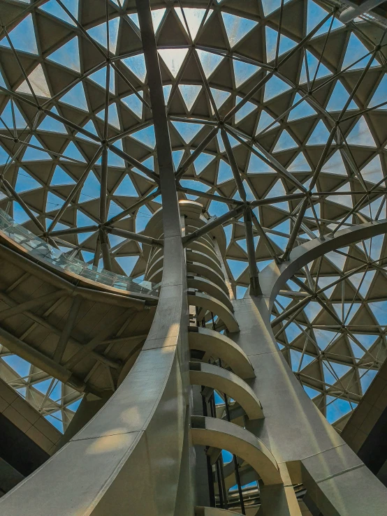 looking up at a structure made of several interlocked angles