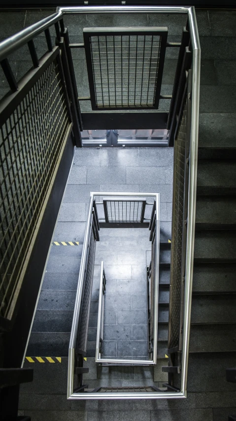 an overhead view of some stairs and handrails