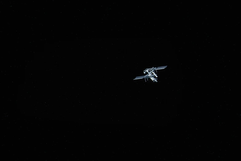 an airplane is flying through the night sky