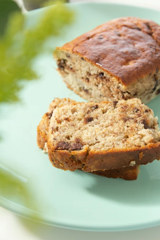 a banana nut and oatmeal loaf on a blue plate