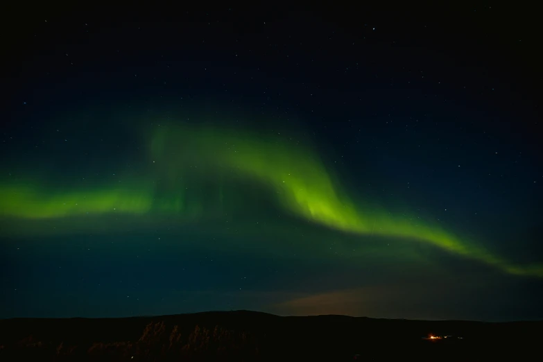 an image of green aurora lights in the night sky