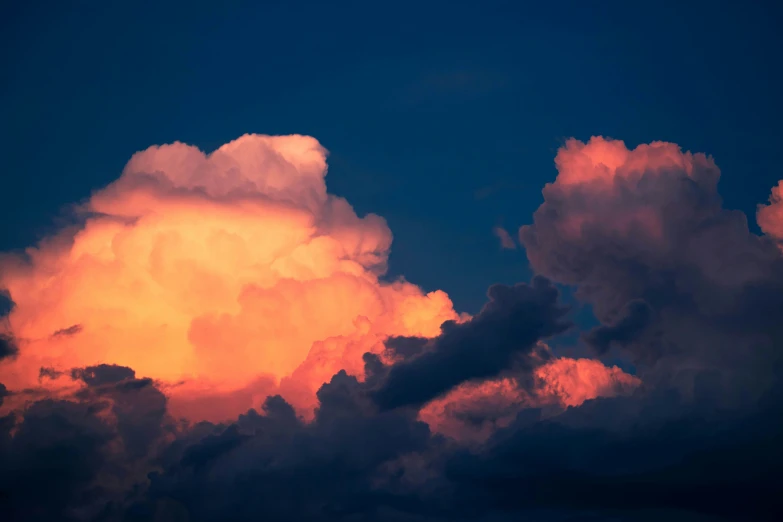 colorful clouds gather together in the sky