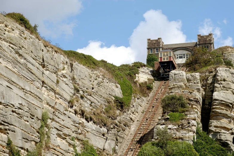 a house is on the top of a mountain