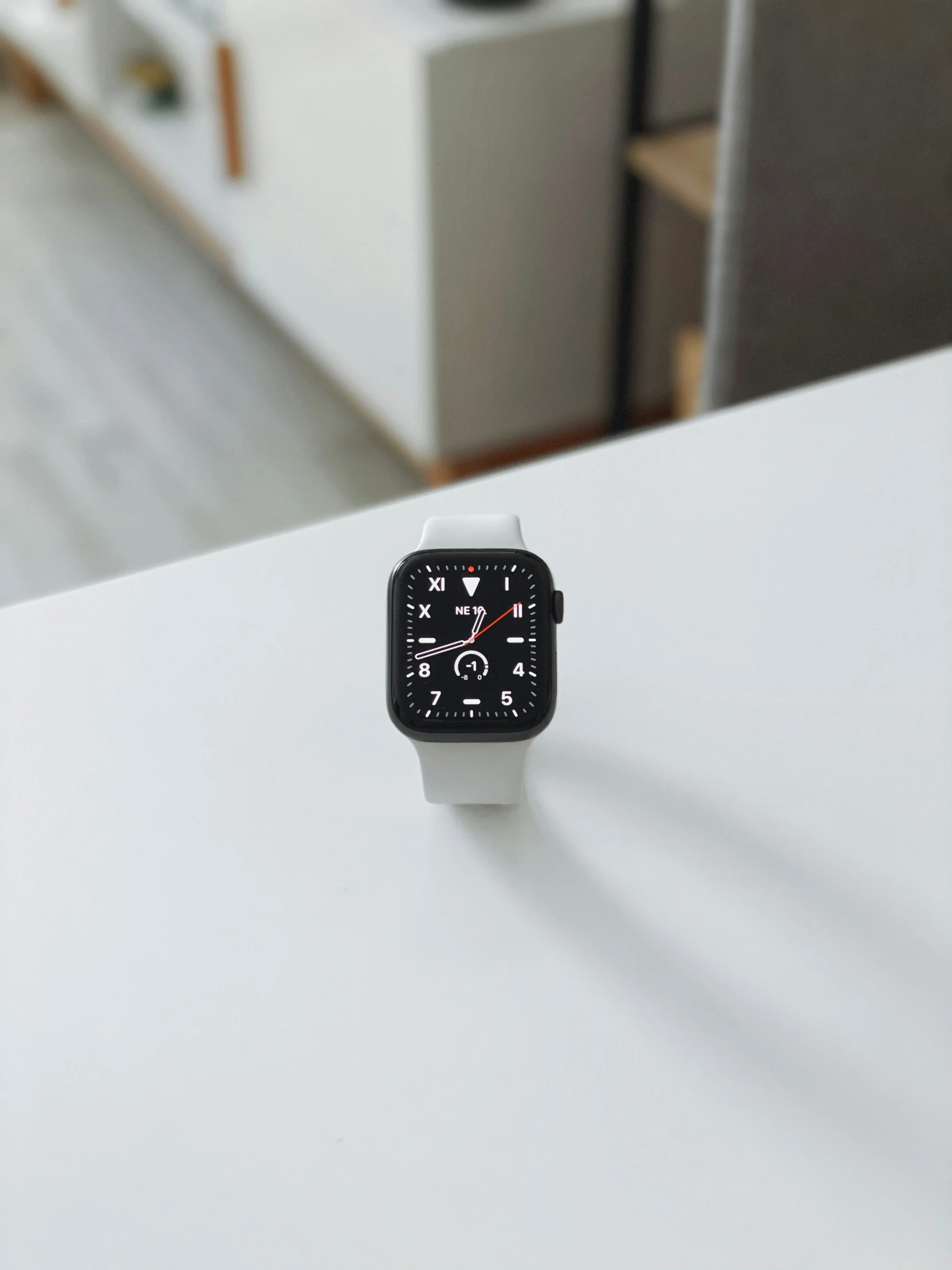 a computer clock on the front end of an apple watch