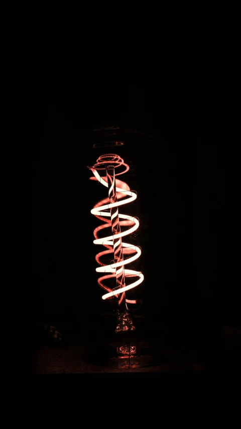 red lights with spirals in the dark night