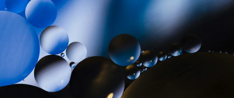 an image of some blue and white balloons