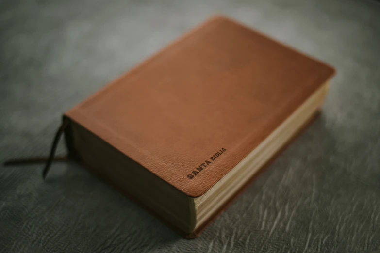 a brown book sitting on top of a table