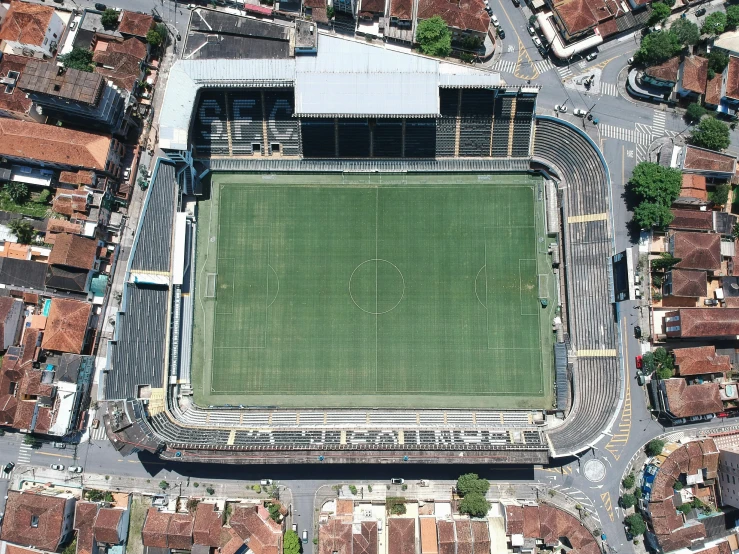 an aerial s of a soccer field in a city