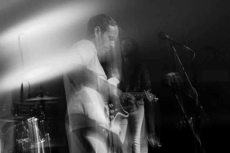 black and white pograph of a band playing