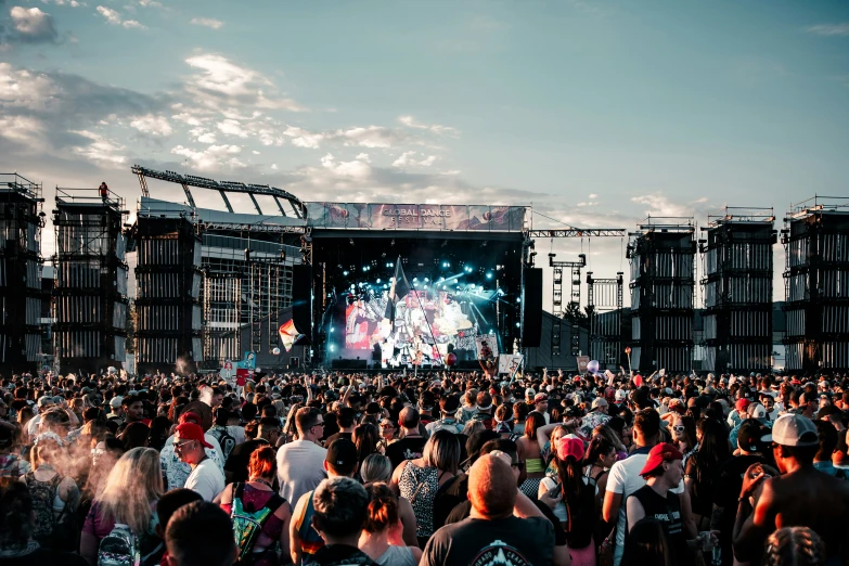 a crowd of people at a music festival