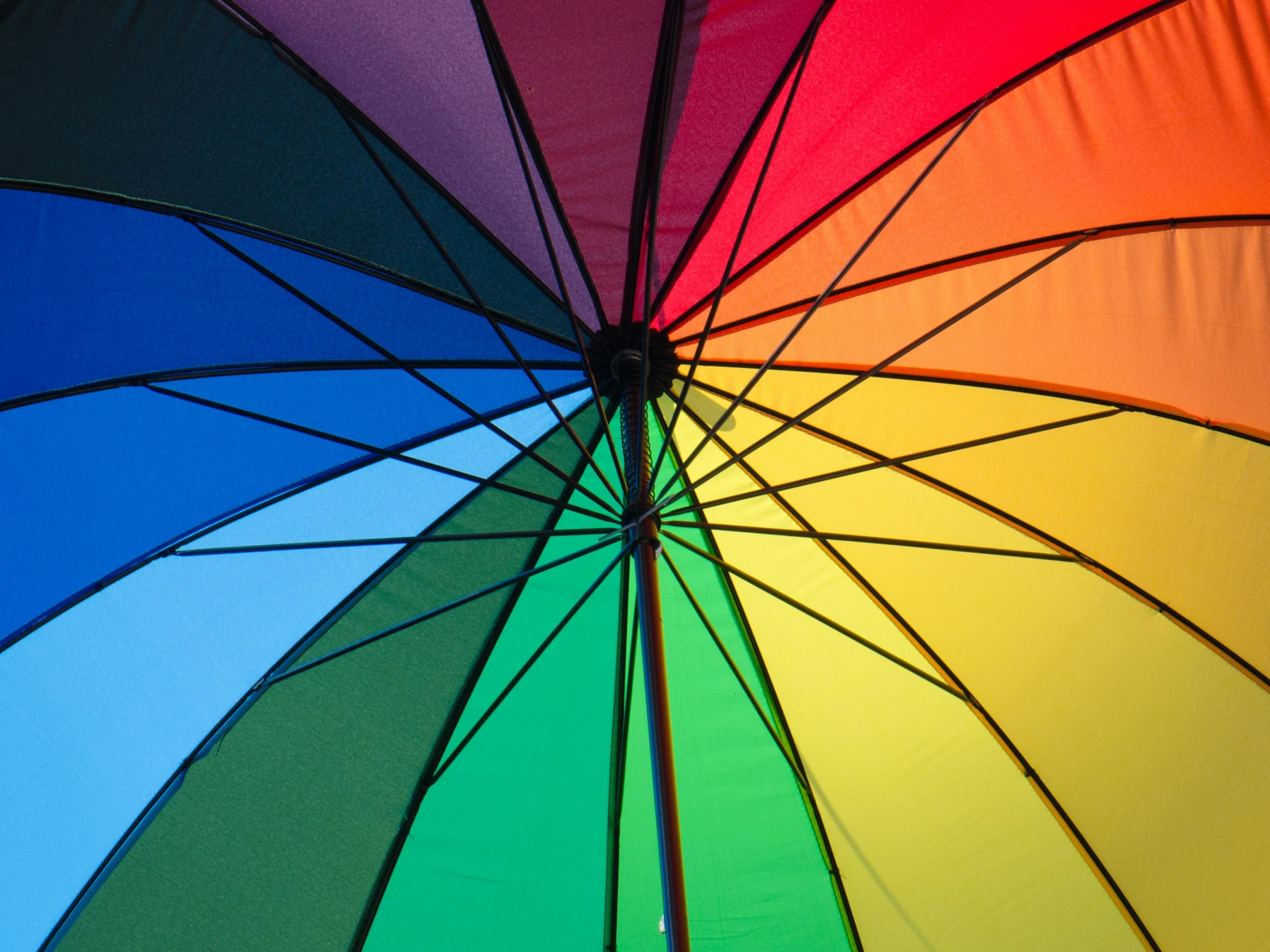 there is a colorful umbrella that is open