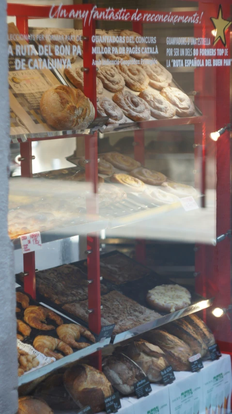 various pastries in display case at a bakery