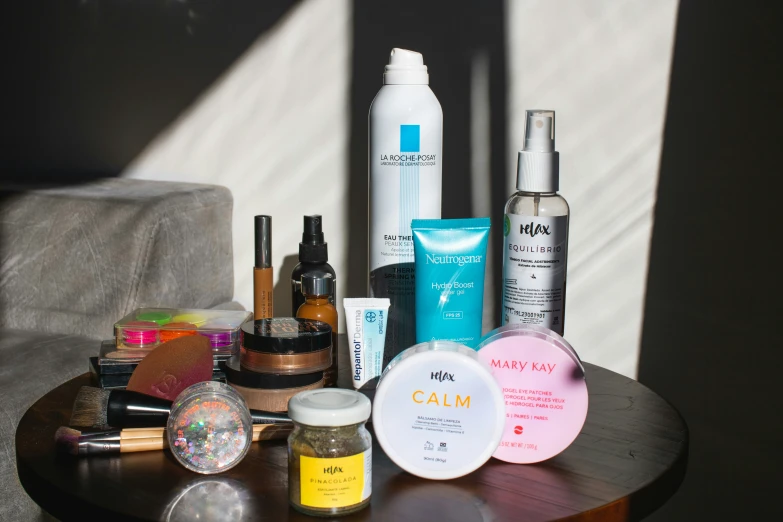 some skin care products sit on a table