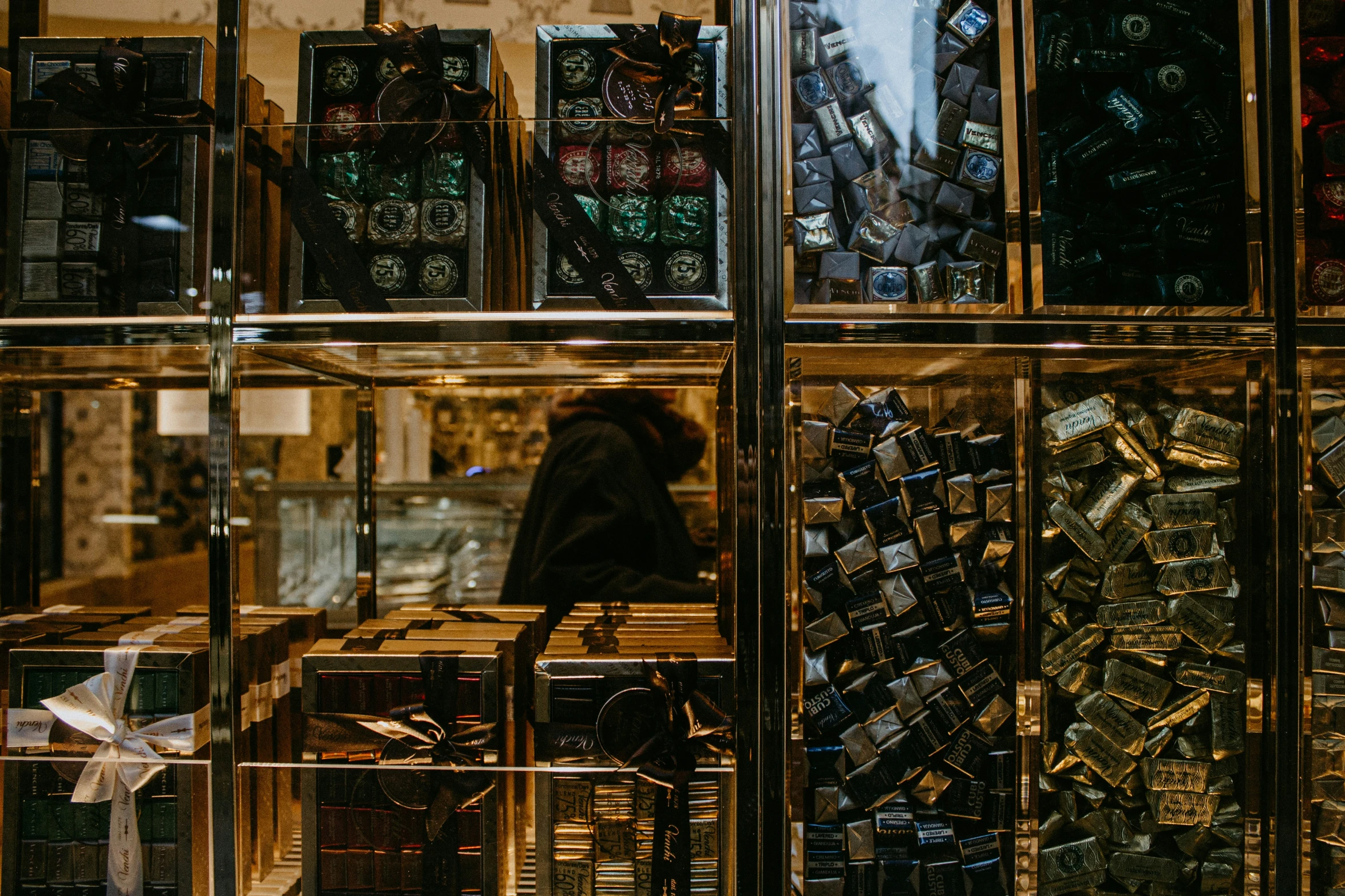 a glass fronted case displaying many different objects