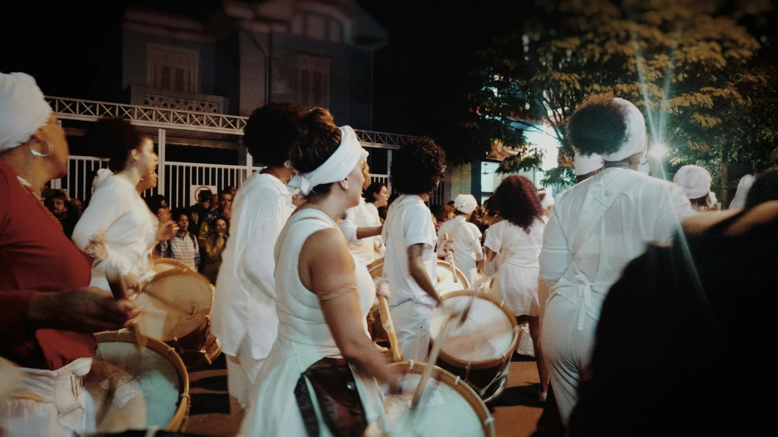 there is an image of a group of people with drums