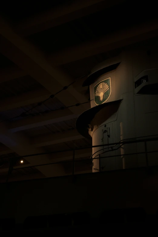 a clock on a building with a green and white design