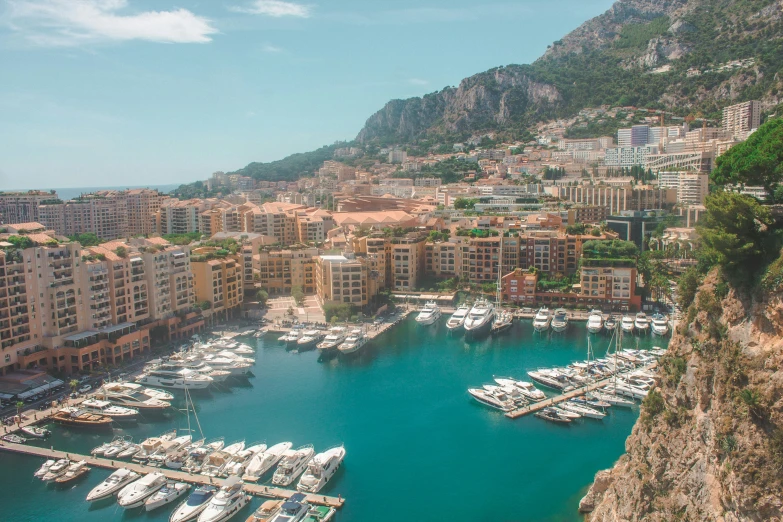 a small harbor surrounded by several mountains