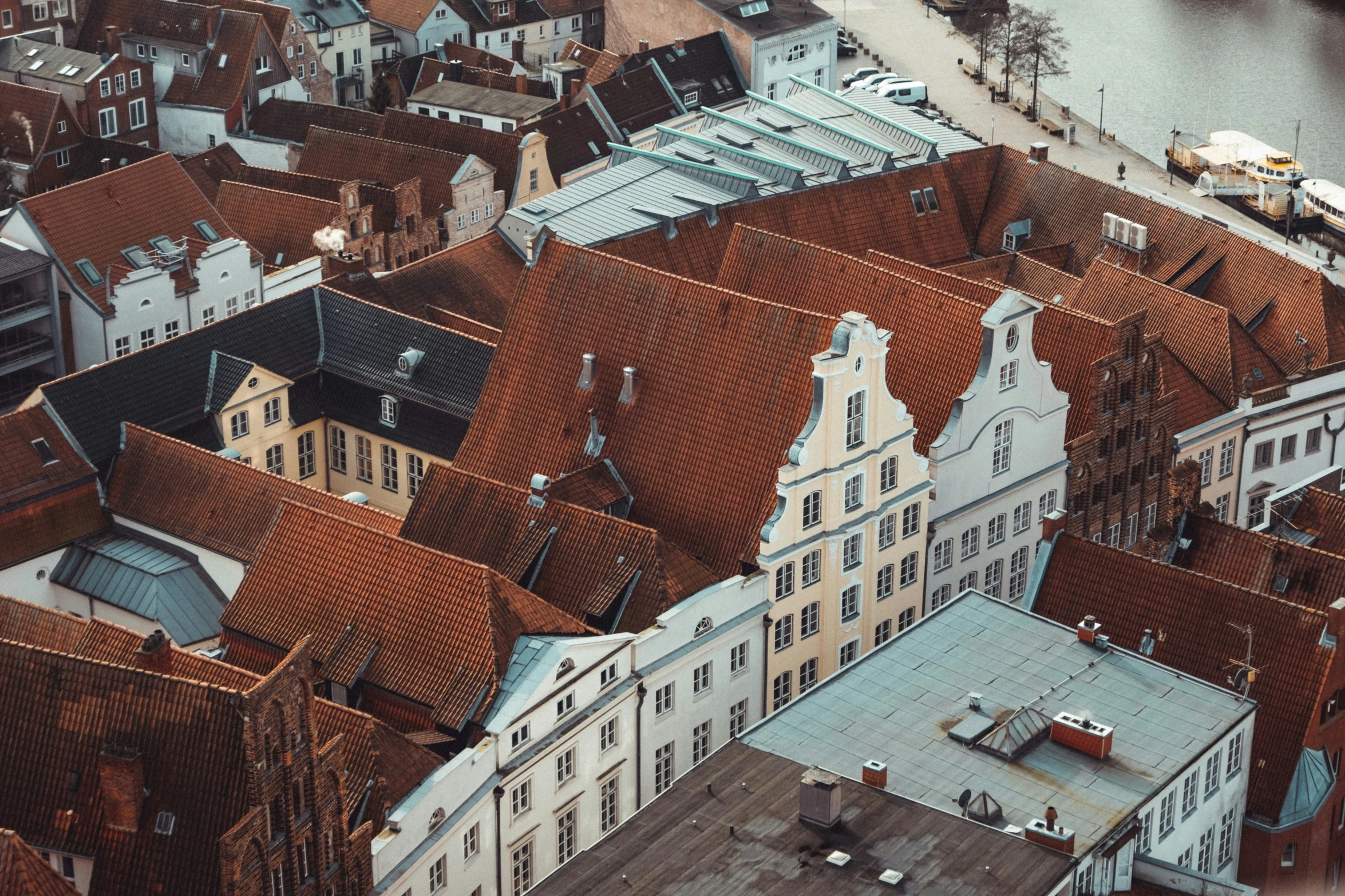 an aerial view of a city with lots of houses