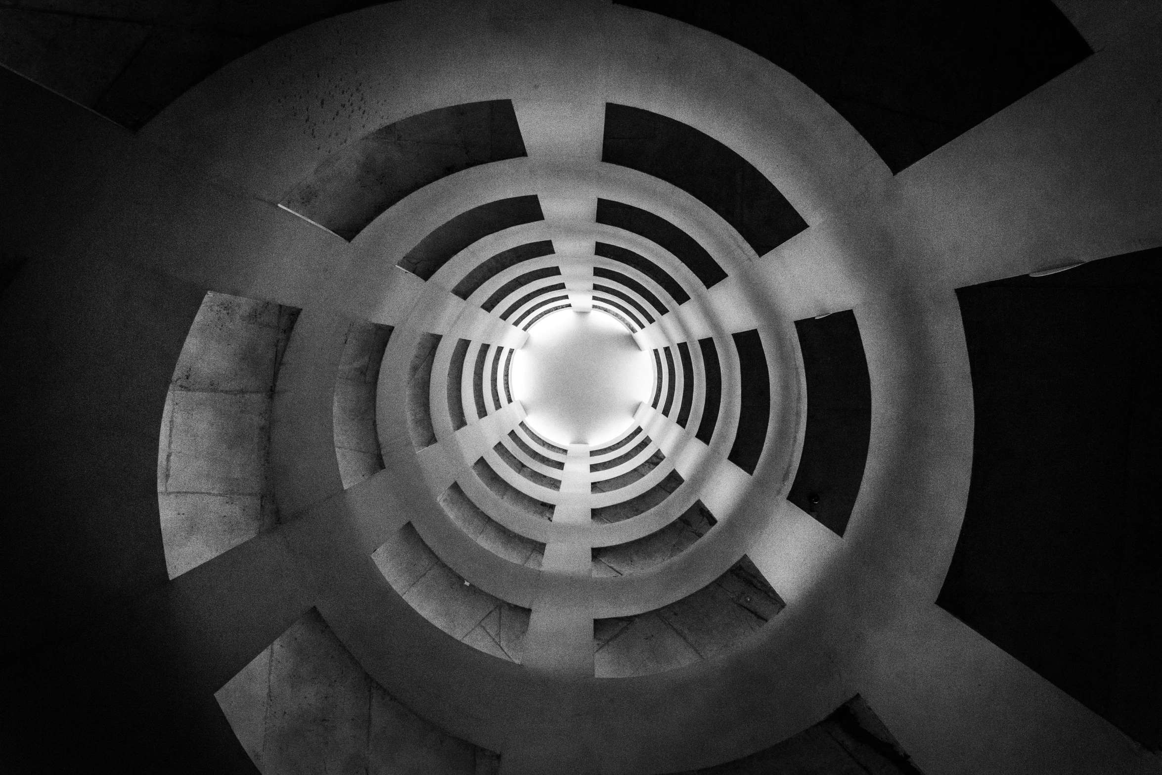 a view inside a building with a round window