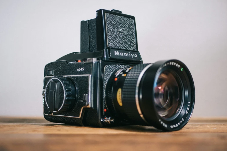 a black camera on a table