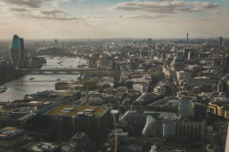 an aerial view of the city with a waterway