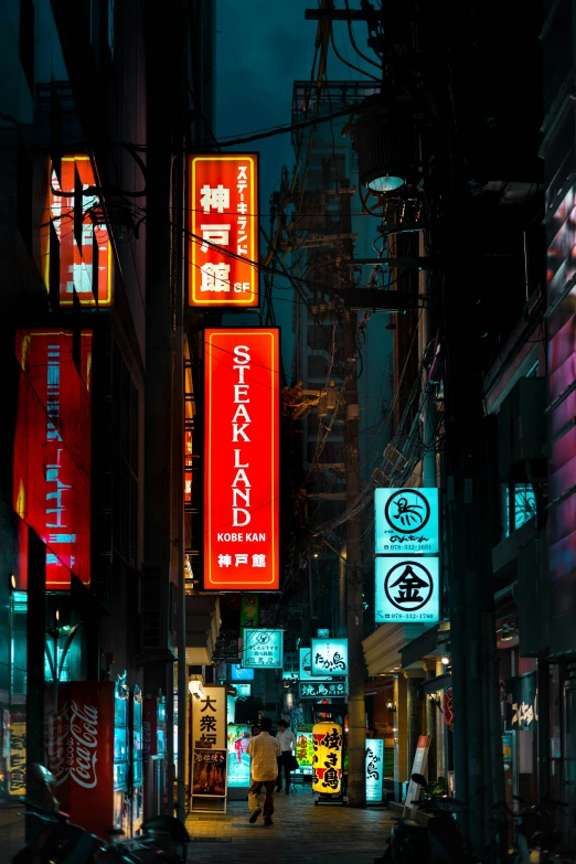 an alleyway at night decorated with asian characters