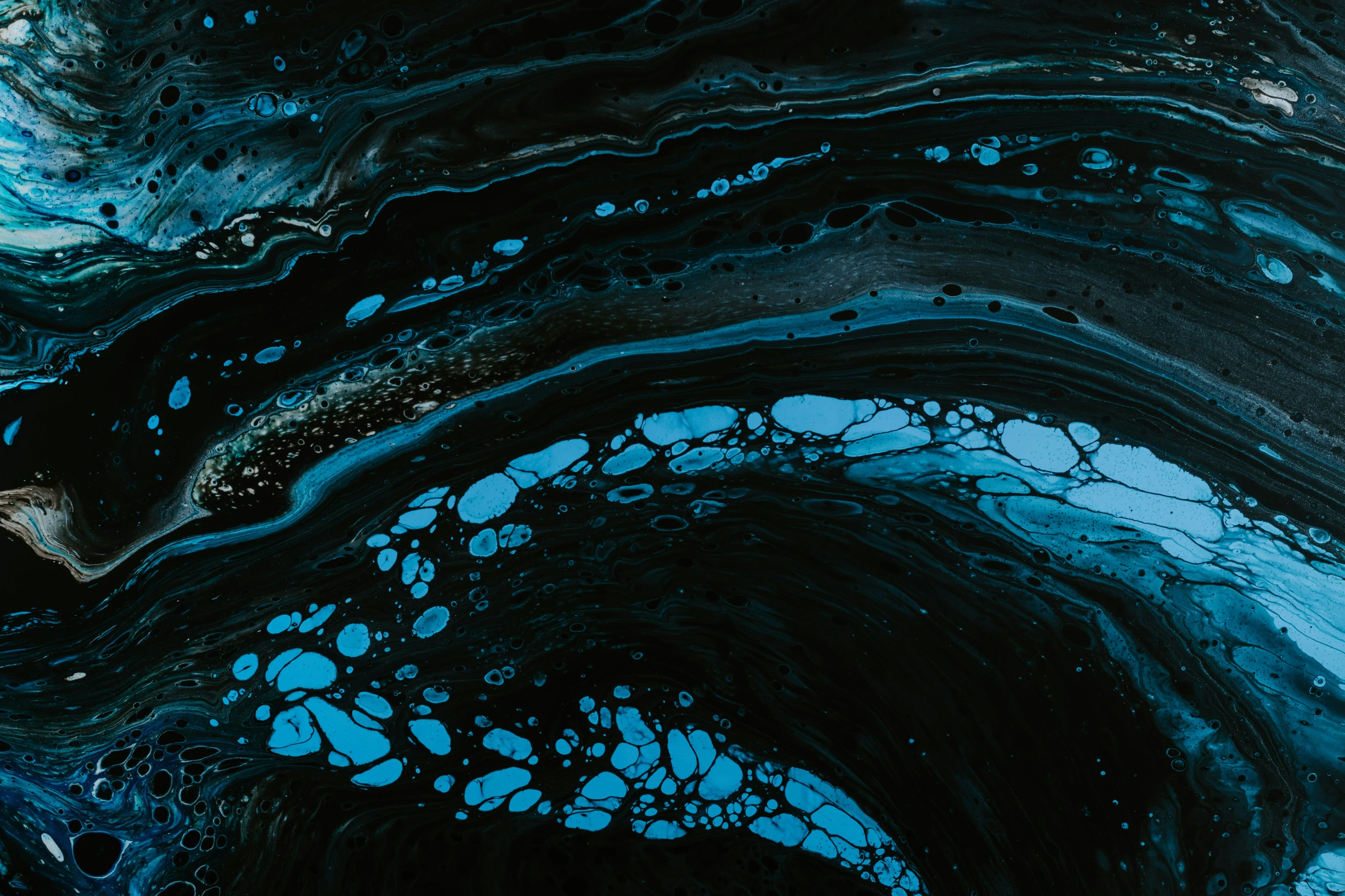 black abstract fluid ink with blue tips