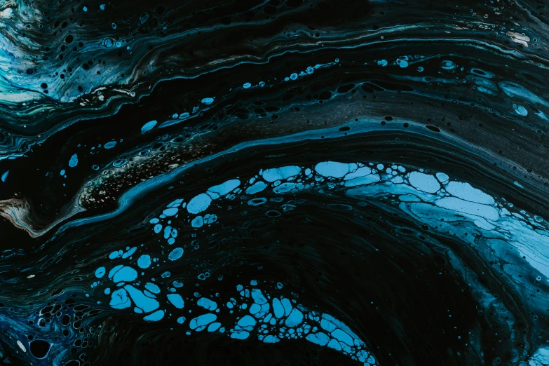 black abstract fluid ink with blue tips