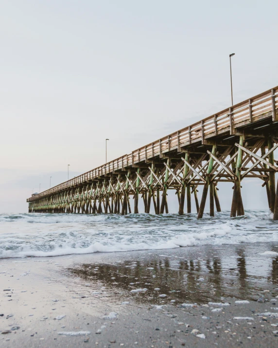 the pier is connected to a long boardwalk