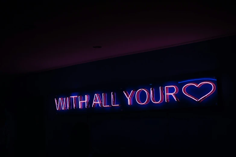 the neon sign has an inscription with all your heart