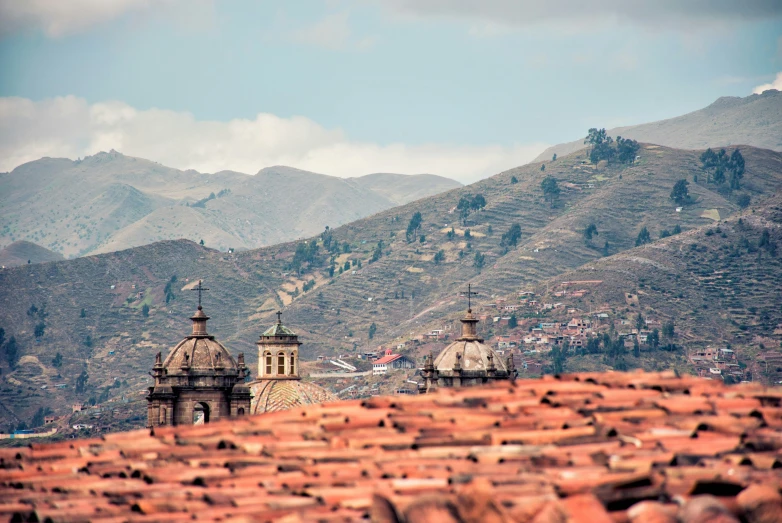 view of an old building on a mountain range