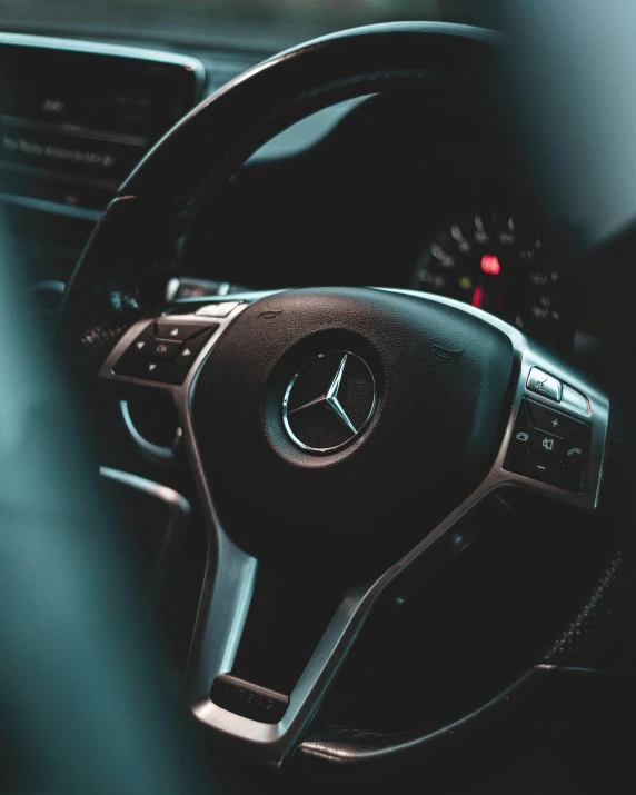 steering wheel in an automobile car at night time