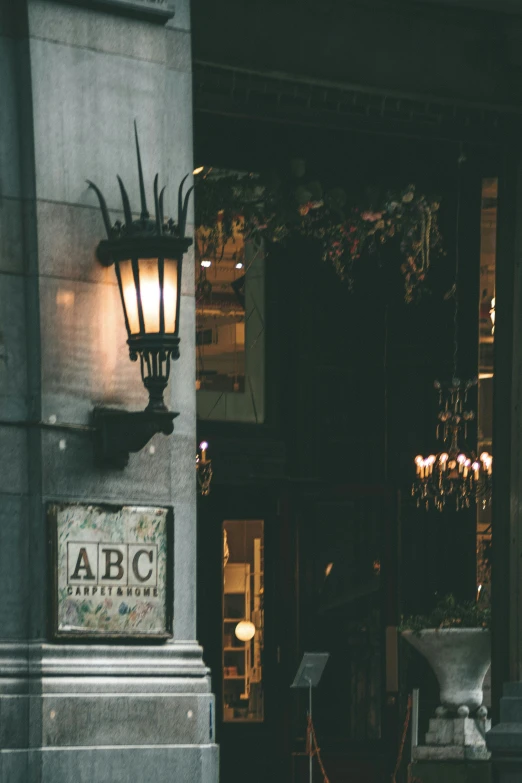 the facade of a restaurant with a clock on the wall