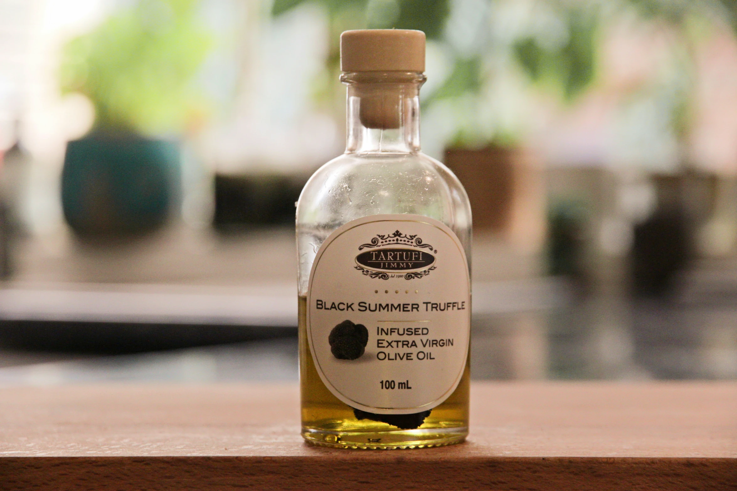 a bottle of black sesame seed hair oil