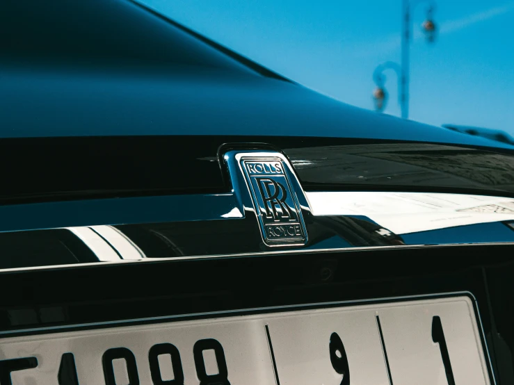 a close up of a license plate on a car