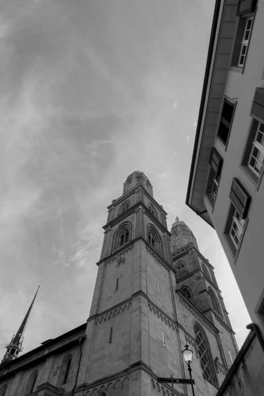 an old clock tower looking up into the sky