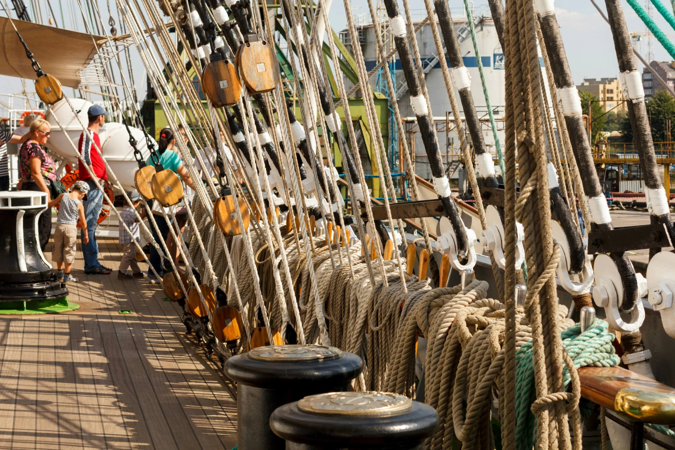 some ropes are hung up next to two people