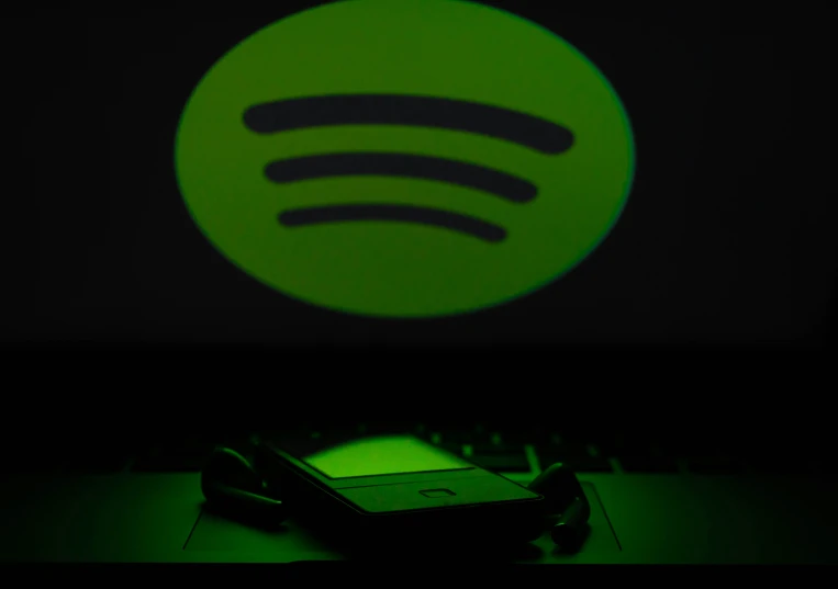 electronic device with glowing green circle on screen