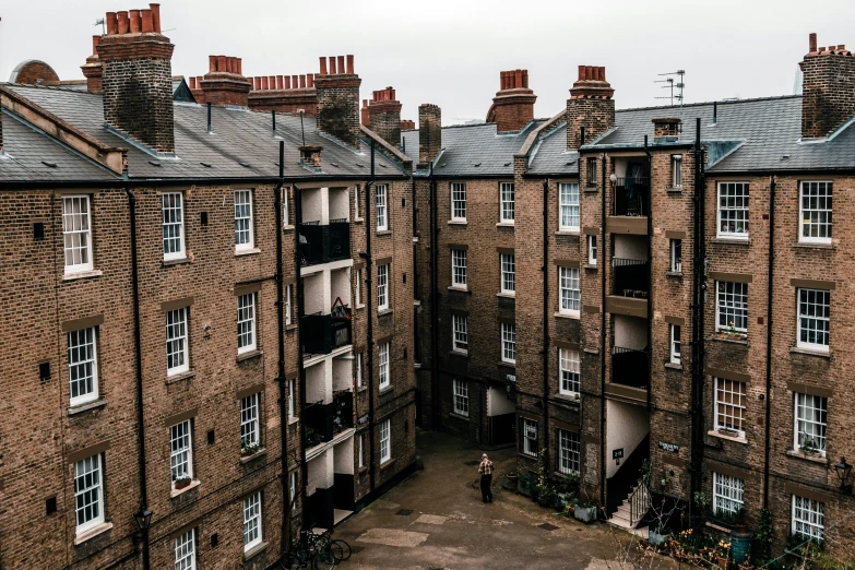 a view from the top of a building towards a courtyard